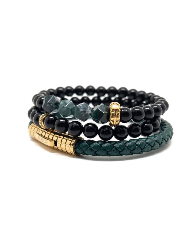 الإبزيم المطلي بالذهب مع كومة من الجلد الأخضر  Main image