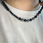 Le collier d'obsidienne